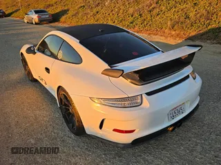 2015 Porsche 911 GT3 with VIN WP0AC2A93FS183928, listed as a Copart auction lot 76354964 with 12,150 mi miles and Salvage Title. Bid and sale history available at DreamBid. Image 4.