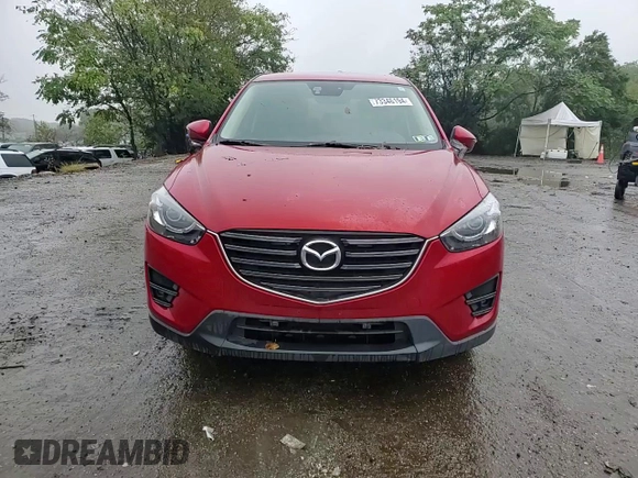 2016 Mazda CX-5 Grand Touring with VIN JM3KE4DY3G0713283, listed as a Copart auction lot 73346194 with 135,382 mi miles and Salvage Title. Bid and sale history available at carsss.com. Image 12.