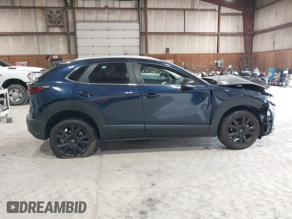 2024 Mazda CX-30 S Select Sport z VIN 3MVDMBBM2RM707143, wystawiony jako IAAI lot #42267284 z przebiegiem 6 133 mil mil oraz . Historia ofert i sprzedaży dostępna na DreamBid. Obrazek 13.