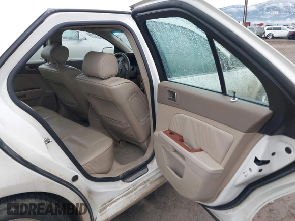 2005 Cadillac STS z VIN 1G6DC67A250231552, wystawiony jako IAAI lot #41765312 z przebiegiem 201 611 mil mil oraz . Historia ofert i sprzedaży dostępna na DreamBid. Obrazek 8.