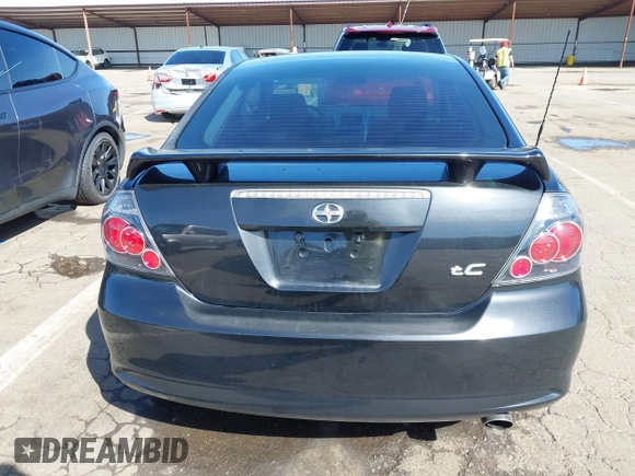 2009 Scion tC with VIN JTKDE167090284572, listed as a IAAI auction lot 41808769 with 132,474 mi miles. Bid and sale history available at carsss.com. Image 16.