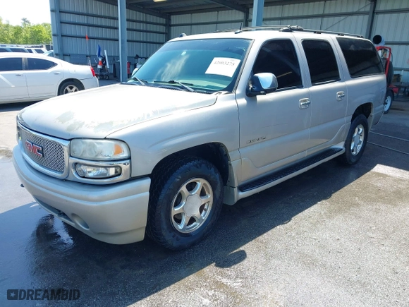 2004 GMC Yukon XL Denali with VIN 1GKFK66U24J283006, listed as a IAAI auction lot 42003275 with 348,268 mi miles. Bid and sale history available at carsss.com. Image 2.