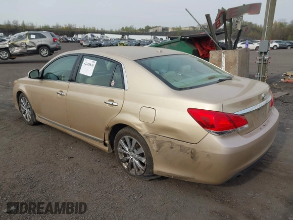 2011 Toyota Avalon with VIN 4T1BK3DB5BU414687, listed as a IAAI auction lot 42103830 with 130,045 mi miles and . Bid and sale history available at carsss.com. Image 3.