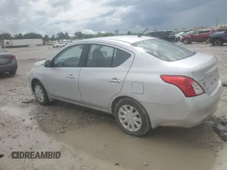 2012 Nissan Versa SV with VIN 3N1CN7AP9CL875493, listed as a Copart auction lot 63058395 with 204,253 mi miles and Salvage title. Bid and sale history available at DreamBid. Image 2.