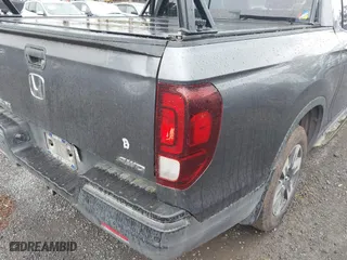 2017 Honda Ridgeline RTL-E with VIN 5FPYK3F76HB034774, listed as a IAAI auction lot 41754824 with 67,451 mi miles. Bid and sale history available at carsss.com. Image 18.