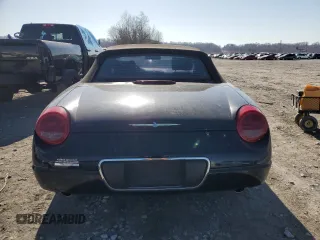 2004 Ford Thunderbird Deluxe z VIN 1FAHP60A24Y101788, wystawiony jako Copart lot #48224125 z przebiegiem 53 383 mil mil oraz Szkoda całkowita • Salvage title. Historia ofert i sprzedaży dostępna na DreamBid. Obrazek 6.