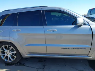 2020 Jeep Grand Cherokee Summit z VIN 1C4RJFJG2LC173184, wystawiony jako IAAI lot #41343182 z przebiegiem 70 192 mil mil oraz . Historia ofert i sprzedaży dostępna na DreamBid. Obrazek 13.
