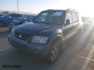 2005 Mitsubishi Montero LTD with VIN JA4MW51S55J001203, listed as a IAAI auction lot 41915695 with 211,868 mi miles. Bid and sale history available at carsss.com. Image 2.