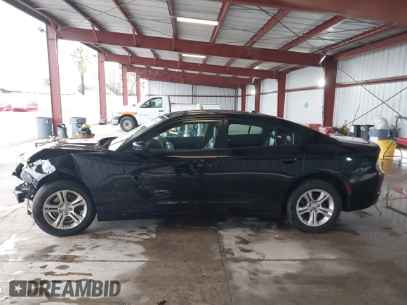2020 Dodge Charger SXT with VIN 2C3CDXBG0LH211627, listed as a IAAI auction lot 41793868 with 104,587 mi miles and . Bid and sale history available at DreamBid. Image 14.