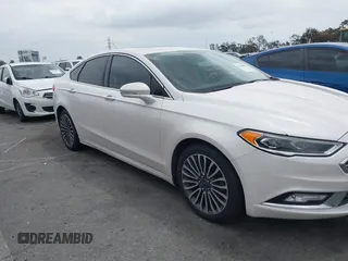 2017 Ford Fusion SE with VIN 3FA6P0HD0HR180188, listed as a IAAI auction lot 42146020 with 100,901 mi miles and . Bid and sale history available at DreamBid. Image 6.