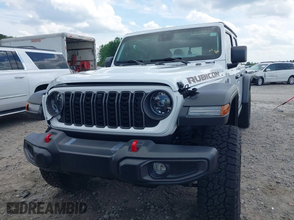 2024 Jeep Gladiator Rubicon z VIN 1C6JJTBG5RL110865, wystawiony jako IAAI lot #42104829 z przebiegiem 6 815 mil mil oraz . Historia ofert i sprzedaży dostępna na DreamBid. Obrazek 12.