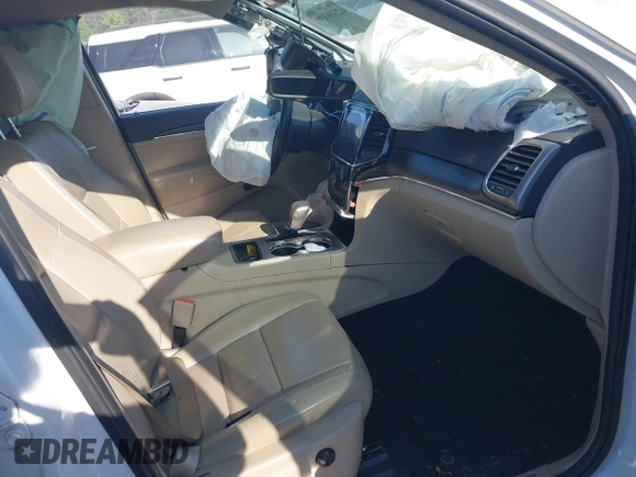 2019 Jeep Grand Cherokee Limited with VIN 1C4RJEBG9KC680641, listed as a IAAI auction lot 42316330 with 91,058 mi miles and . Bid and sale history available at DreamBid. Image 5.