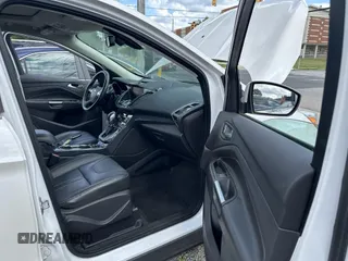 2013 Ford Escape Titanium with VIN 1FMCU9J95DUB21698, listed as a IAAI auction lot 42694998 with 170,593 mi miles and . Bid and sale history available at DreamBid. Image 5.