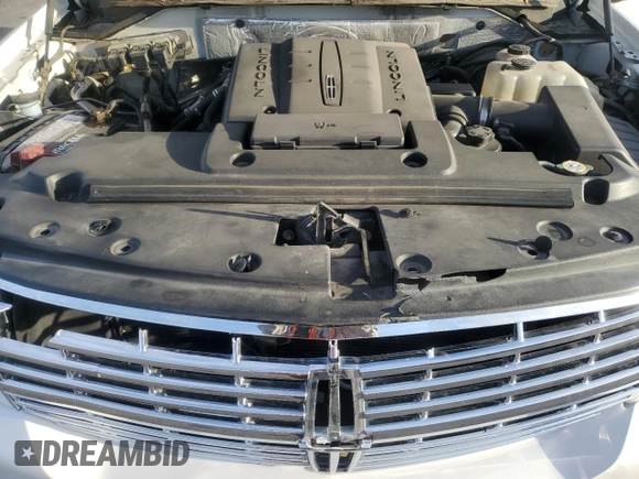 2010 Lincoln Navigator z VIN 5LMJJ2H58AEJ10577, wystawiony jako Copart lot #46904225 z przebiegiem 131 479 mil mil oraz Czysty tytuł • Clean title. Historia ofert i sprzedaży dostępna na DreamBid. Obrazek 12.