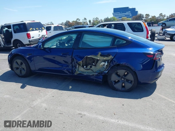 2023 Tesla Model 3 with VIN 5YJ3E1EA1PF431190, listed as a IAAI auction lot 41980007 with 26,164 mi miles and . Bid and sale history available at DreamBid. Image 14.
