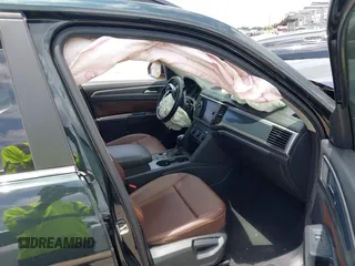 2021 Volkswagen Atlas SE z VIN 1V2PR2CA7MC510191, wystawiony jako IAAI lot #42235942 z przebiegiem 108 597 mil mil oraz . Historia ofert i sprzedaży dostępna na DreamBid. Obrazek 5.