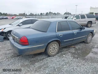 2007 Mercury Grand Marquis GS with VIN 2MEFM74V27X609128, listed as a IAAI auction lot 41474359 with 99,050 mi miles. Bid and sale history available at carsss.com. Image 4.