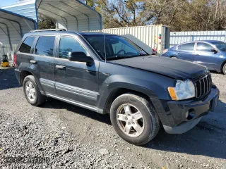 2005 Jeep Grand Cherokee Laredo with VIN 1J4HS48N05C566325, listed as a Copart auction lot 84743394 with 160,840 mi miles and Salvage Title. Bid and sale history available at carsss.com. Image 4.