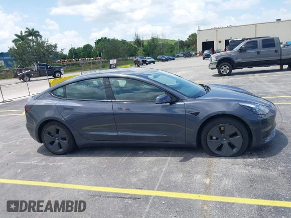 2023 Tesla Model 3 z VIN 5YJ3E1EA3PF435158, wystawiony jako IAAI lot #42356031 z przebiegiem 41 408 mil mil oraz . Historia ofert i sprzedaży dostępna na DreamBid. Obrazek 13.