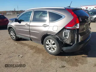 2014 Honda CR-V EX-L with VIN 5J6RM4H74EL017601, listed as a IAAI auction lot 41480716 with 187,685 mi miles. Bid and sale history available at carsss.com. Image 3.