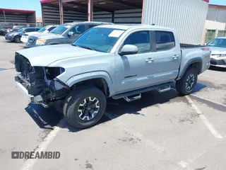2019 Toyota Tacoma SR with VIN 3TMCZ5AN7KM213537, listed as a IAAI auction lot 42442068 with 39,969 mi miles and . Bid and sale history available at DreamBid. Image 18.