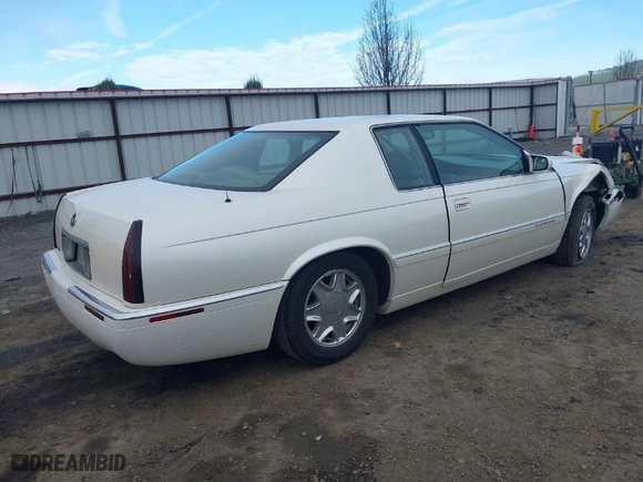 1998 Cadillac Eldorado with VIN 1G6EL12Y2WU603722, listed as a IAAI auction lot 41879733 with 81,780 mi miles. Bid and sale history available at carsss.com. Image 4.