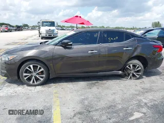 2016 Nissan Maxima SR with VIN 1N4AA6AP9GC405420, listed as a IAAI auction lot 41933739 with 59,680 mi miles and . Bid and sale history available at DreamBid. Image 6.