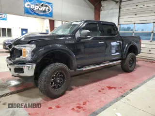 2019 Ford F-150 XL with VIN 1FTEW1E5XKKD49141, listed as a Copart auction lot 57410005 with 84,828 mi miles and Salvage title. Bid and sale history available at DreamBid. Image 1.