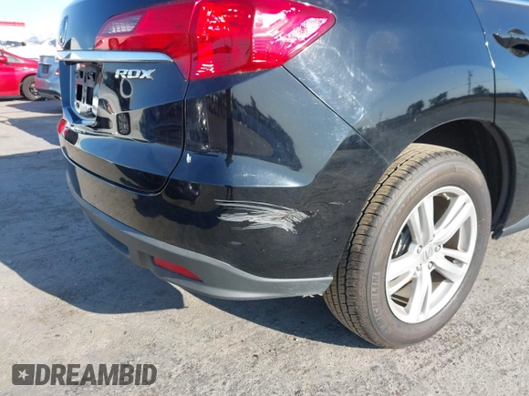 2015 Acura RDX z VIN 5J8TB3H38FL000506, wystawiony jako IAAI lot #42452545 z przebiegiem 105 478 mil mil oraz . Historia ofert i sprzedaży dostępna na DreamBid. Obrazek 6.