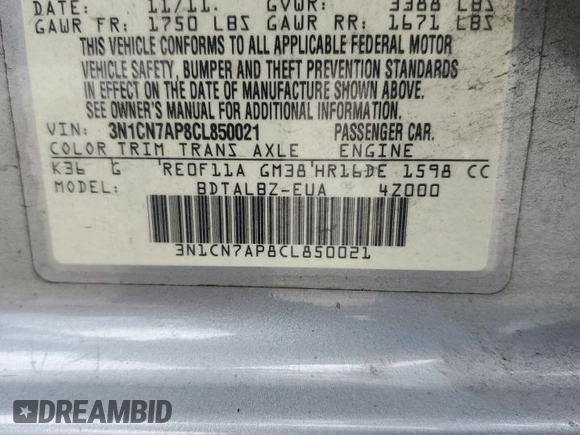 2012 Nissan Versa SV with VIN 3N1CN7AP8CL850021, listed as a Copart auction lot 60979605 with 238,261 mi miles and Salvage title. Bid and sale history available at DreamBid. Image 13.