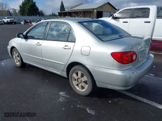 2004 Toyota Corolla CE with VIN 1NXBR38E34Z277929, listed as a IAAI auction lot 41807213 with 197,757 mi miles. Bid and sale history available at carsss.com. Image 3.