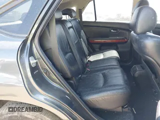 2004 Lexus RX 330 with VIN JTJGA31U340001595, listed as a IAAI auction lot 42125099 with 238,834 mi miles. Bid and sale history available at carsss.com. Image 8.
