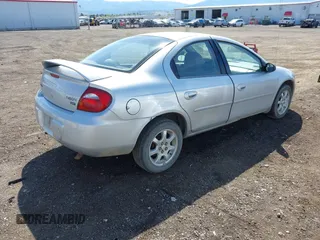 2005 Dodge Neon SXT with VIN 1B3ES56C75D273890, listed as a IAAI auction lot 42149159 with 212,741 mi miles. Bid and sale history available at carsss.com. Image 4.