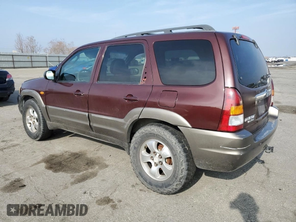 2002 Mazda Tribute LX with VIN 4F2CU08172KM34759, listed as a Copart auction lot 81631974 with 254,286 mi miles and Salvage Title. Bid and sale history available at carsss.com. Image 2.