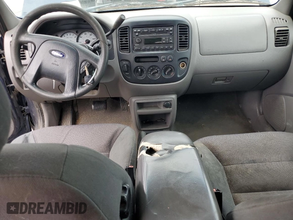 2002 Ford Escape XLT Choice with VIN 1FMYU04192KD87001, listed as a Copart auction lot 57860475 with 195,323 mi miles and Salvage title. Bid and sale history available at DreamBid. Image 8.