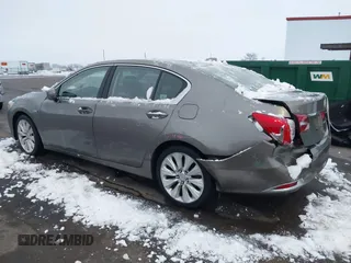 2014 Acura RLX Hybrid Advance Pkg with VIN JH4KC2F92EC000068, listed as a IAAI auction lot 41158553 with 108,325 mi miles. Bid and sale history available at carsss.com. Image 3.
