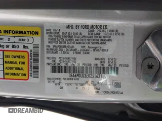 2014 Ford Fusion SE Hybrid with VIN 3FA6P0LU3ER251631, listed as a IAAI auction lot 41917855 with 88,076 mi miles. Bid and sale history available at carsss.com. Image 9.