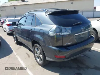 2006 Lexus RX 400h with VIN JTJHW31U560009707, listed as a IAAI auction lot 42148672 with 198,569 mi miles and . Bid and sale history available at DreamBid. Image 3.