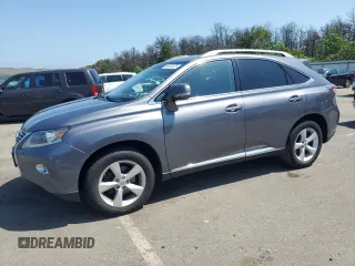 2015 Lexus RX 350 with VIN 2T2BK1BA5FC285254, listed as a Copart auction lot 60932825 with 137,400 mi miles and Salvage title. Bid and sale history available at DreamBid. Image 1.