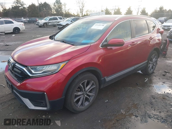 2020 Honda CR-V Touring with VIN 2HKRW2H96LH659793, listed as a IAAI auction lot 41145758 with 113,344 mi miles and . Bid and sale history available at DreamBid. Image 2.