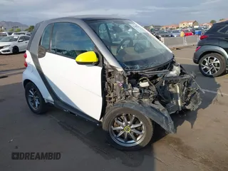 2014 Smart fortwo Pure z VIN WMEEJ3BA3EK741265, wystawiony jako IAAI lot #42185357 z przebiegiem 56 753 mil mil oraz . Historia ofert i sprzedaży dostępna na DreamBid. Obrazek 1.