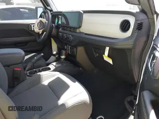 2024 Jeep Wrangler Sahara with VIN 1C4RJXP61RW126904, listed as a IAAI auction lot 41998215 with 32,034 mi miles and . Bid and sale history available at DreamBid. Image 5.