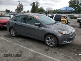 2017 Ford Focus SE with VIN 1FADP3FE3HL235896, listed as a Copart auction lot 50910975 with 74,502 mi miles and Salvage Title. Bid and sale history available at carsss.com. Image 4.