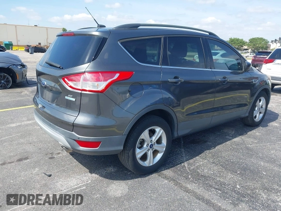 2016 Ford Escape SE with VIN 1FMCU0GXXGUB66870, listed as a IAAI auction lot 42219454 with 116,158 mi miles and . Bid and sale history available at carsss.com. Image 4.