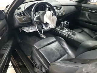 2015 BMW Z4 sDrive28i with VIN WBALL5C52FP557059, listed as a Copart auction lot 71438184 with 0 mi miles and Salvage Title. Bid and sale history available at carsss.com. Image 8.