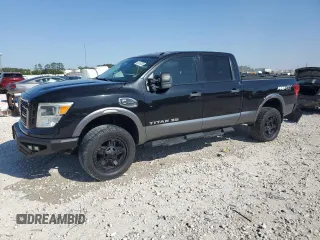 2016 Nissan Titan SL z VIN 1N6BA1F4XGN509402, wystawiony jako Copart lot #52410795 z przebiegiem 37 421 mil mil oraz Szkoda całkowita • Salvage title. Historia ofert i sprzedaży dostępna na DreamBid. Obrazek 1.