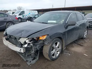 2009 Acura TSX with VIN JH4CU26669C019140, listed as a IAAI auction lot 41633824 with 174,997 mi miles. Bid and sale history available at carsss.com. Image 2.