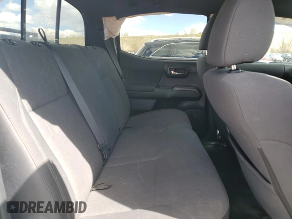 2018 Toyota Tacoma SR with VIN 5TFCZ5AN3JX128204, listed as a Copart auction lot 53970865 with 76,986 mi miles and Salvage Title. Bid and sale history available at DreamBid. Image 10.