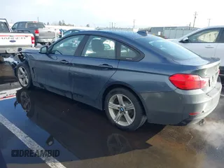 2015 BMW 4 Series 428i xDrive with VIN WBA4C9C55FD331207, listed as a IAAI auction lot 41636906 with 131,306 mi miles and . Bid and sale history available at DreamBid. Image 3.