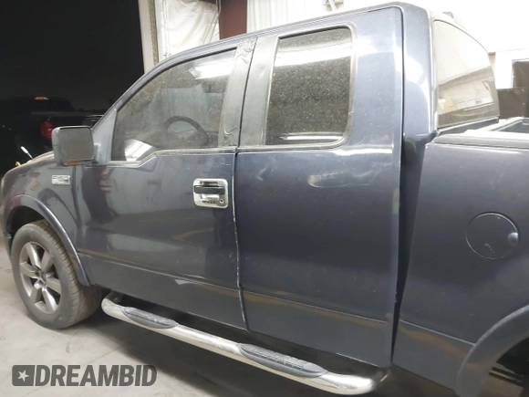 2004 Ford F-150 XLT with VIN 1FTRX12594KD77602, listed as a IAAI auction lot 41482440 with 299,407 mi miles. Bid and sale history available at carsss.com. Image 14.